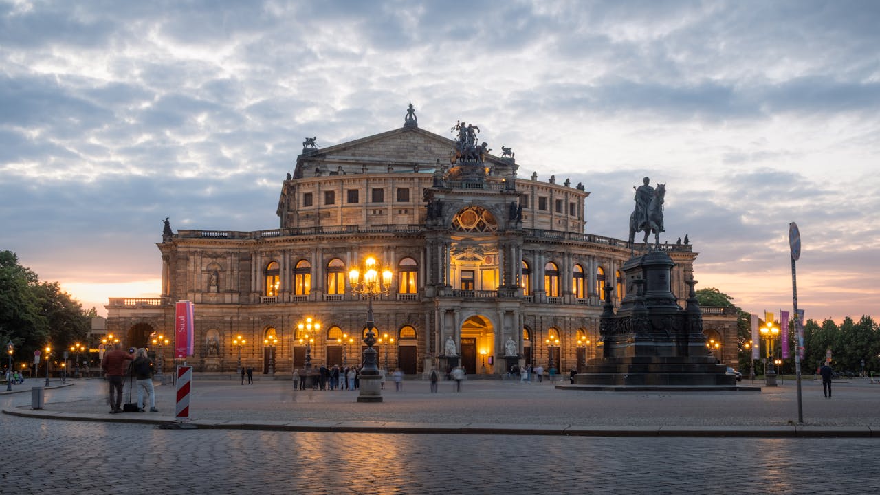 Stunning twilight view of the Semperoper and equestrian statue in Dresden, Germany.